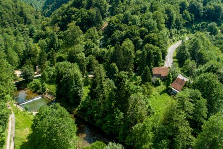 Croatia – House, Outbuilding and 5,264 m² of Building Land by the River