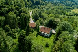 Croatia – House, Outbuilding and 5,264 m² of Building Land by the River